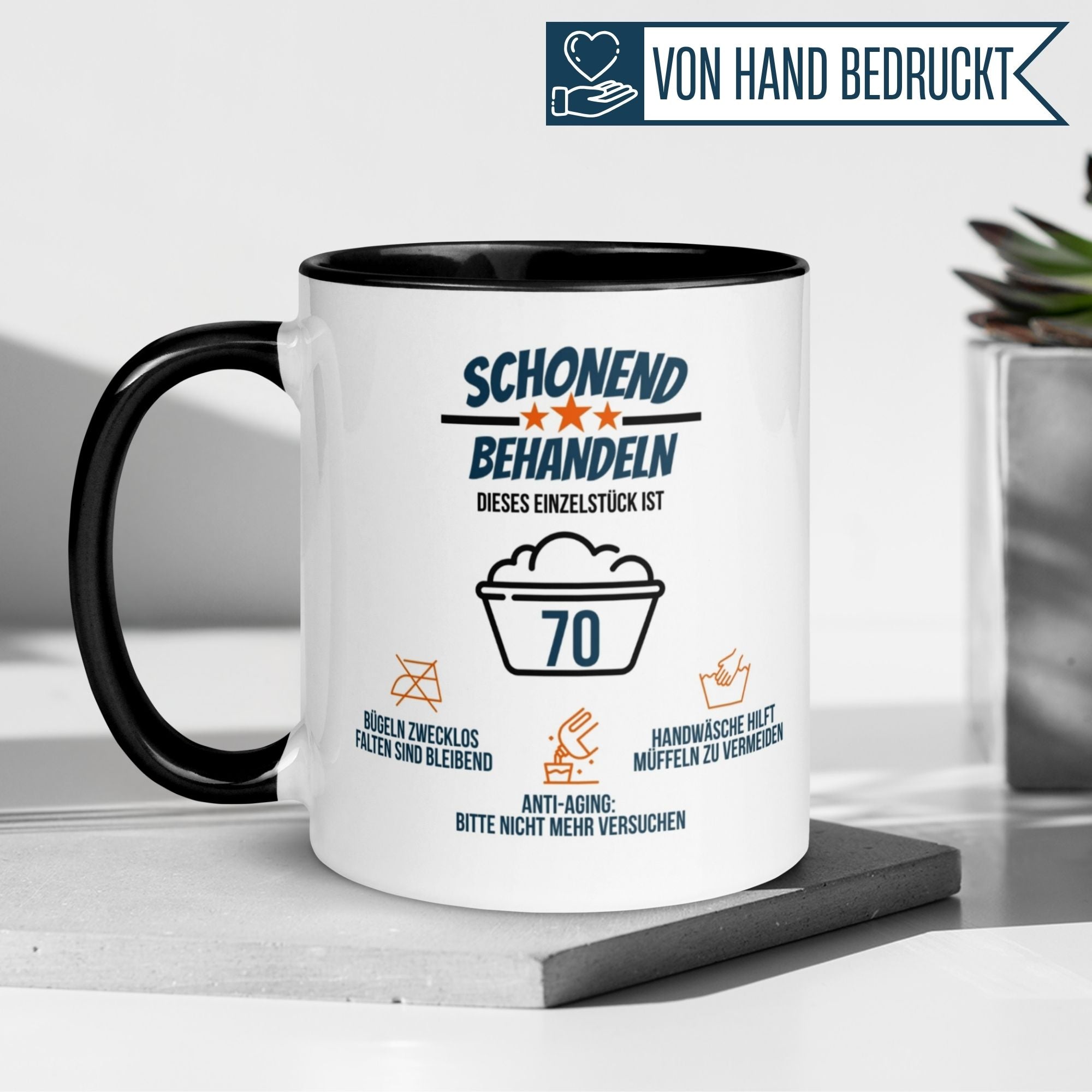 Momentals Tasse zum 70. Geburtstag mit humorvollem Spruch "Schonend behandeln" für Männer.