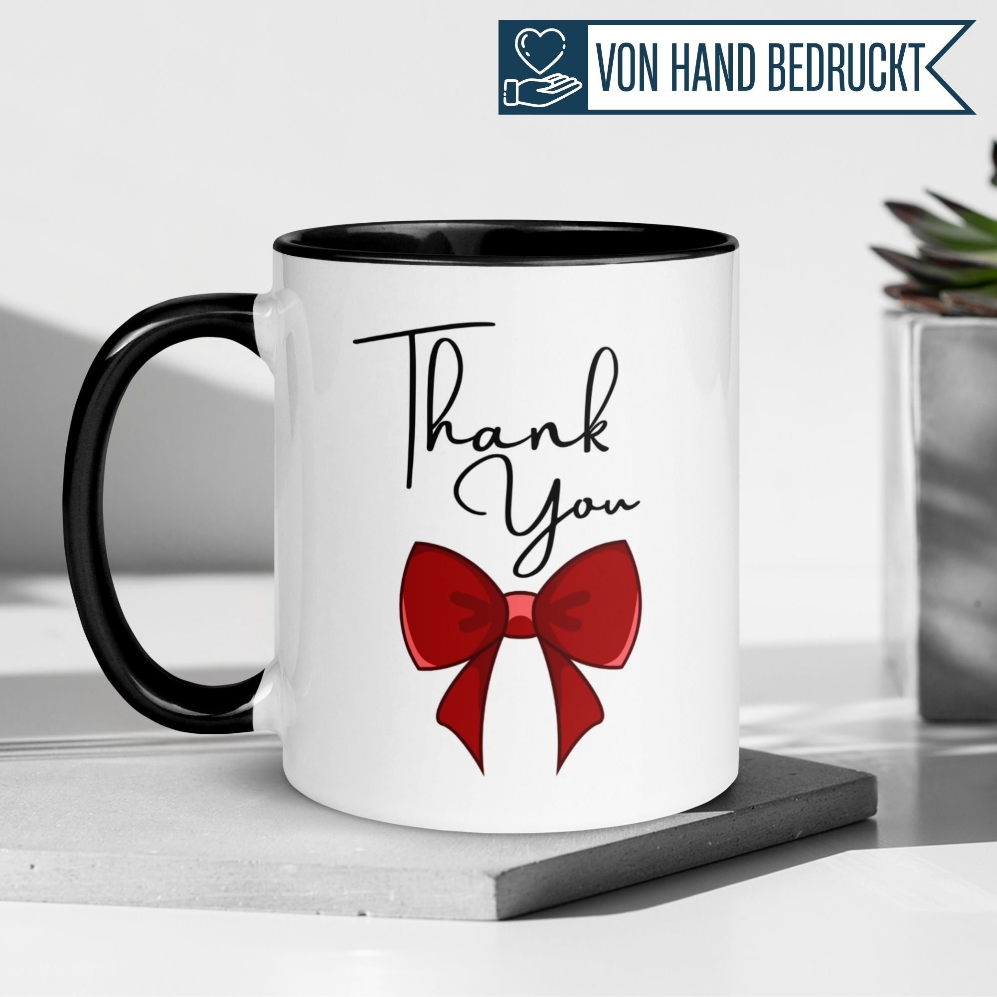 Momentals® Tasse mit roter Schleife und 'Thank You' für herzliche Dankesbotschaften.