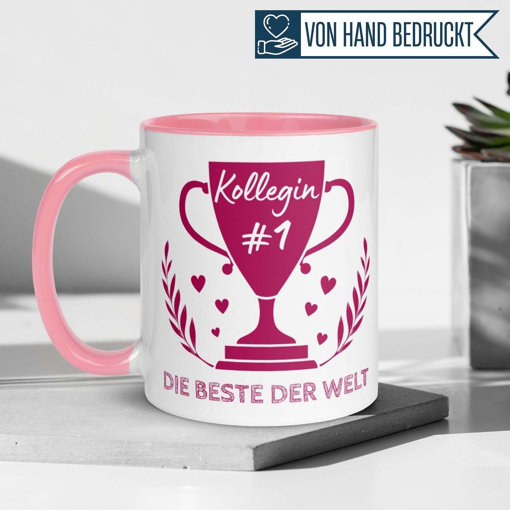 Momentals Tasse Kollegin #1 mit Spruch "Die Beste der Welt" und Pokal-Motiv, ideal für ein Dankeschön.