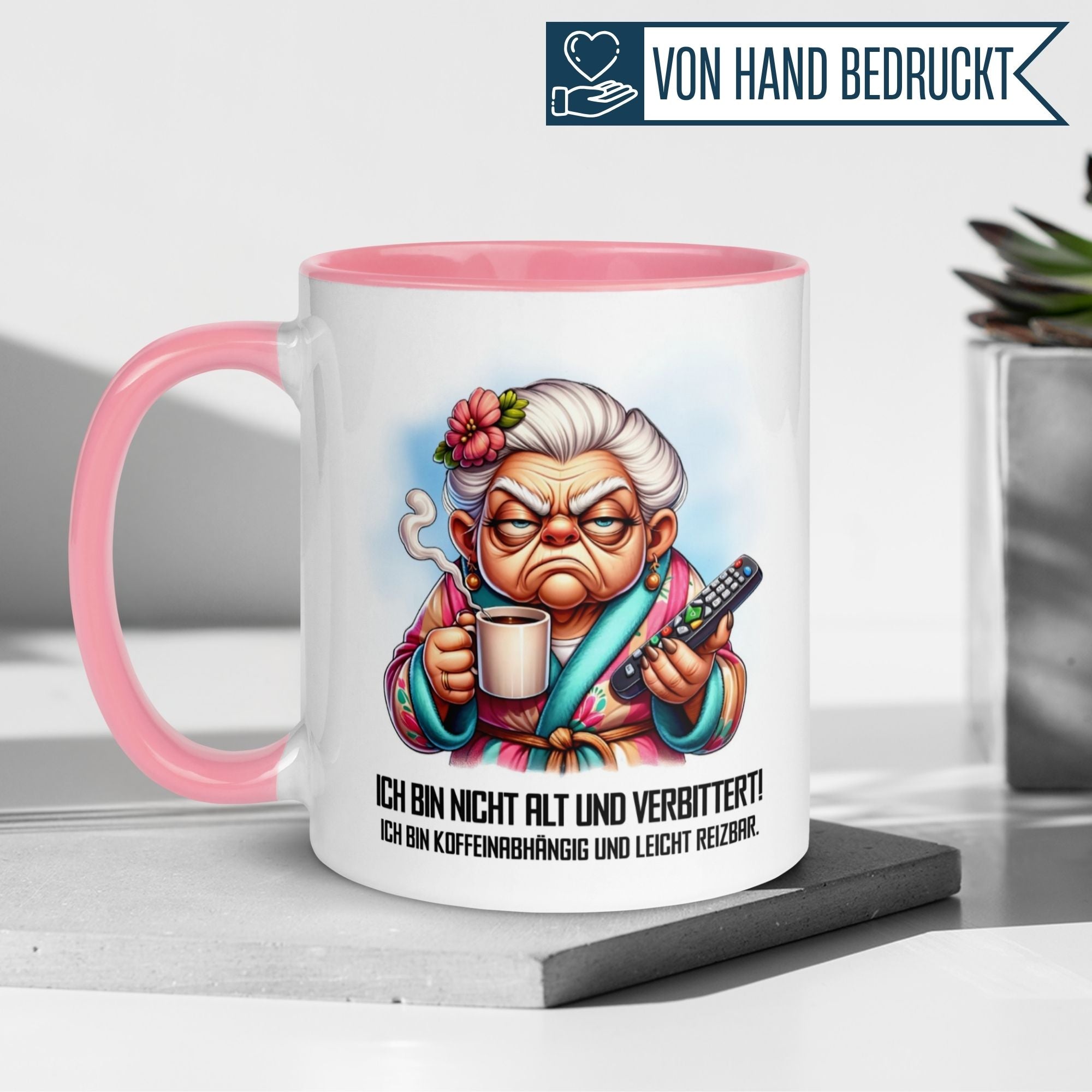 Mug with cartoon grandma saying 'Ich bin nicht alt, ich bin koffeinabhängig' for all morning grumps.
