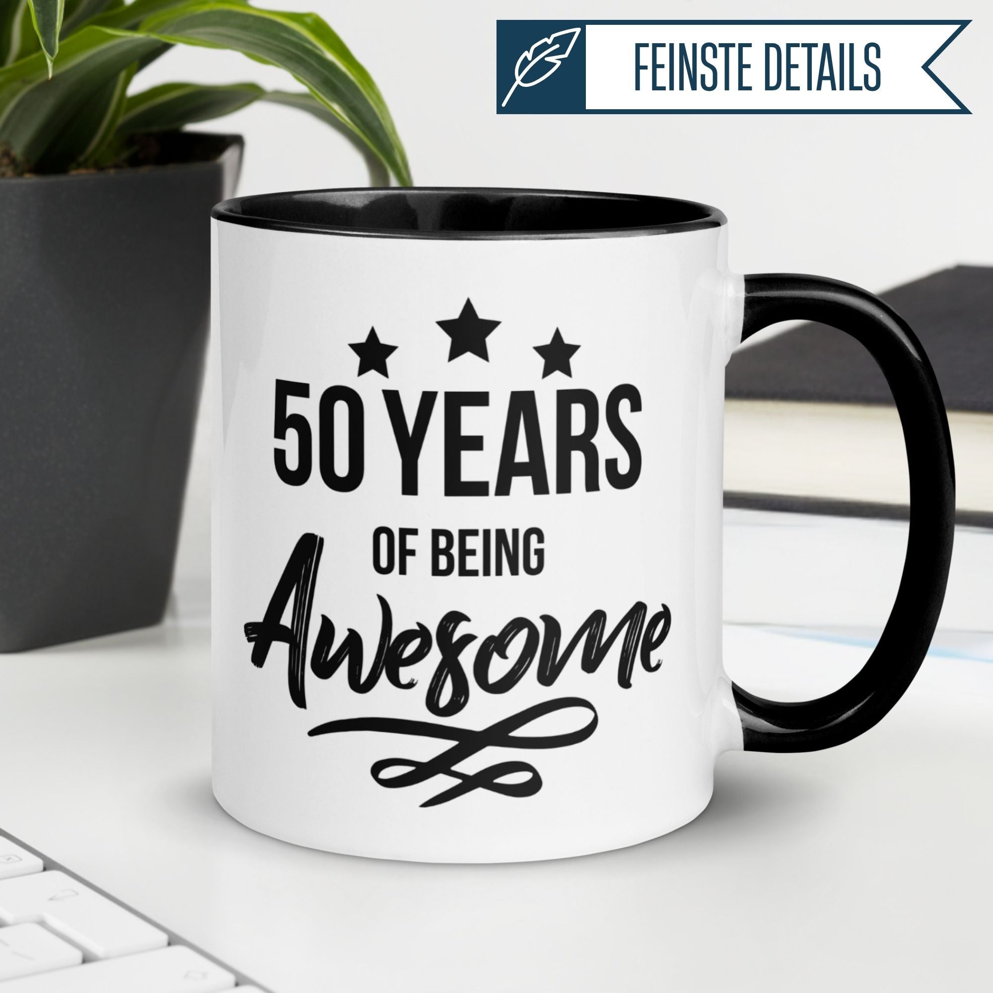 Momentals® birthday mug for 50th, celebrating 50 years of being awesome with a stylish black handle.