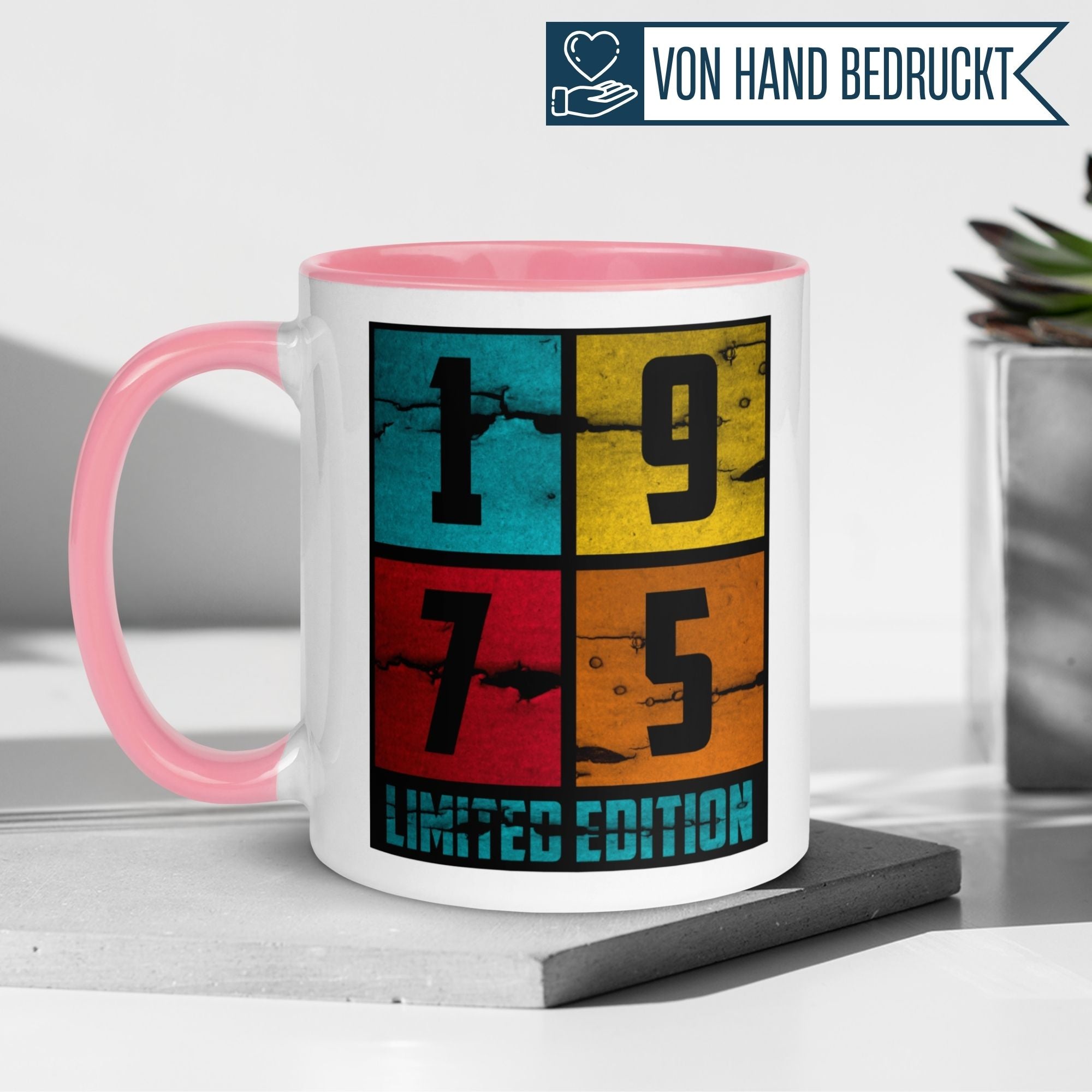 Momentals® 50th birthday mug in pink, featuring colorful limited edition 1975 design for a joyful gift.