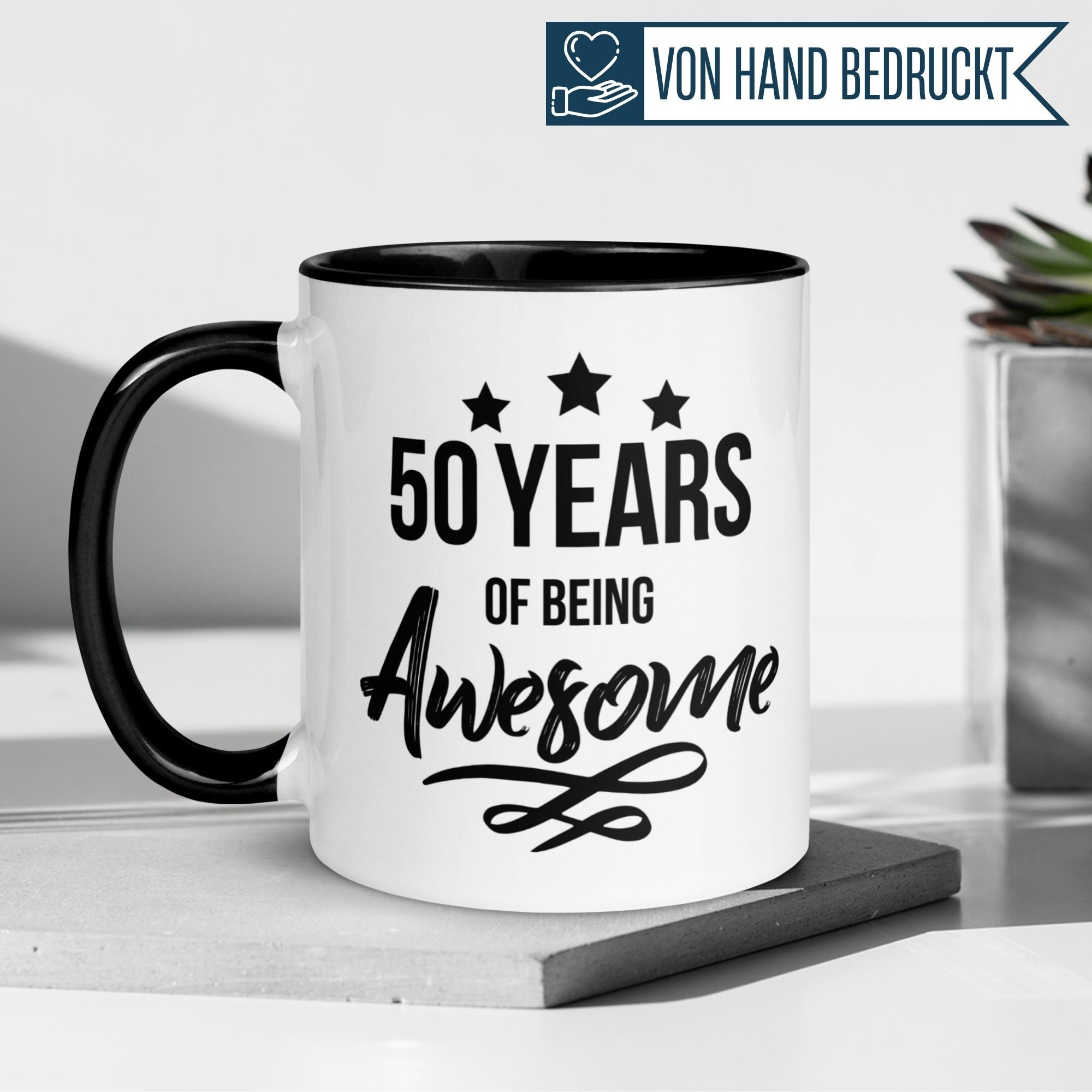 Momentals® Tasse für 50. Geburtstag mit Spruch '50 Years of being Awesome' auf schwarzem Henkel