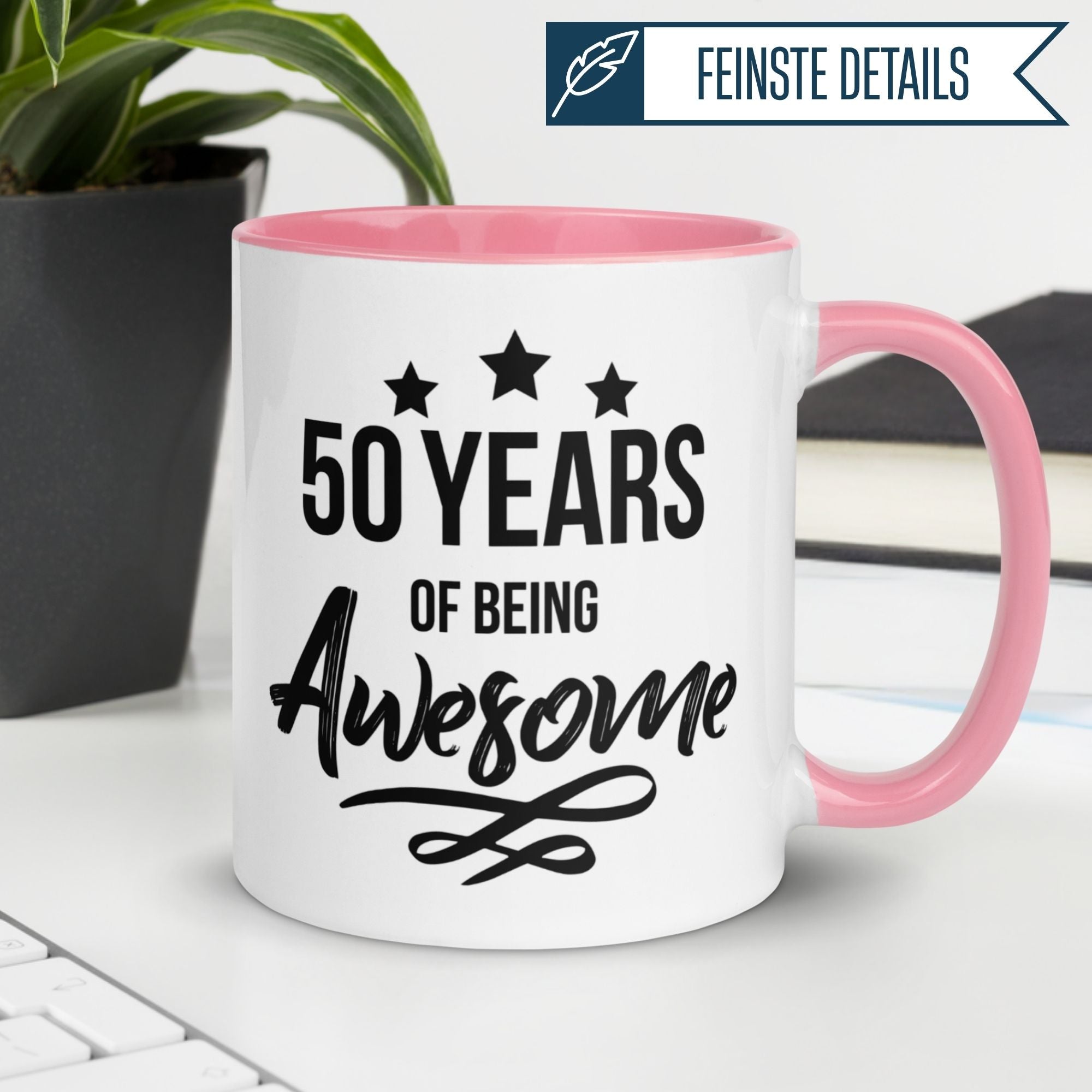 Momentals® birthday mug celebrating 50 years of being awesome with stars and pink handle.