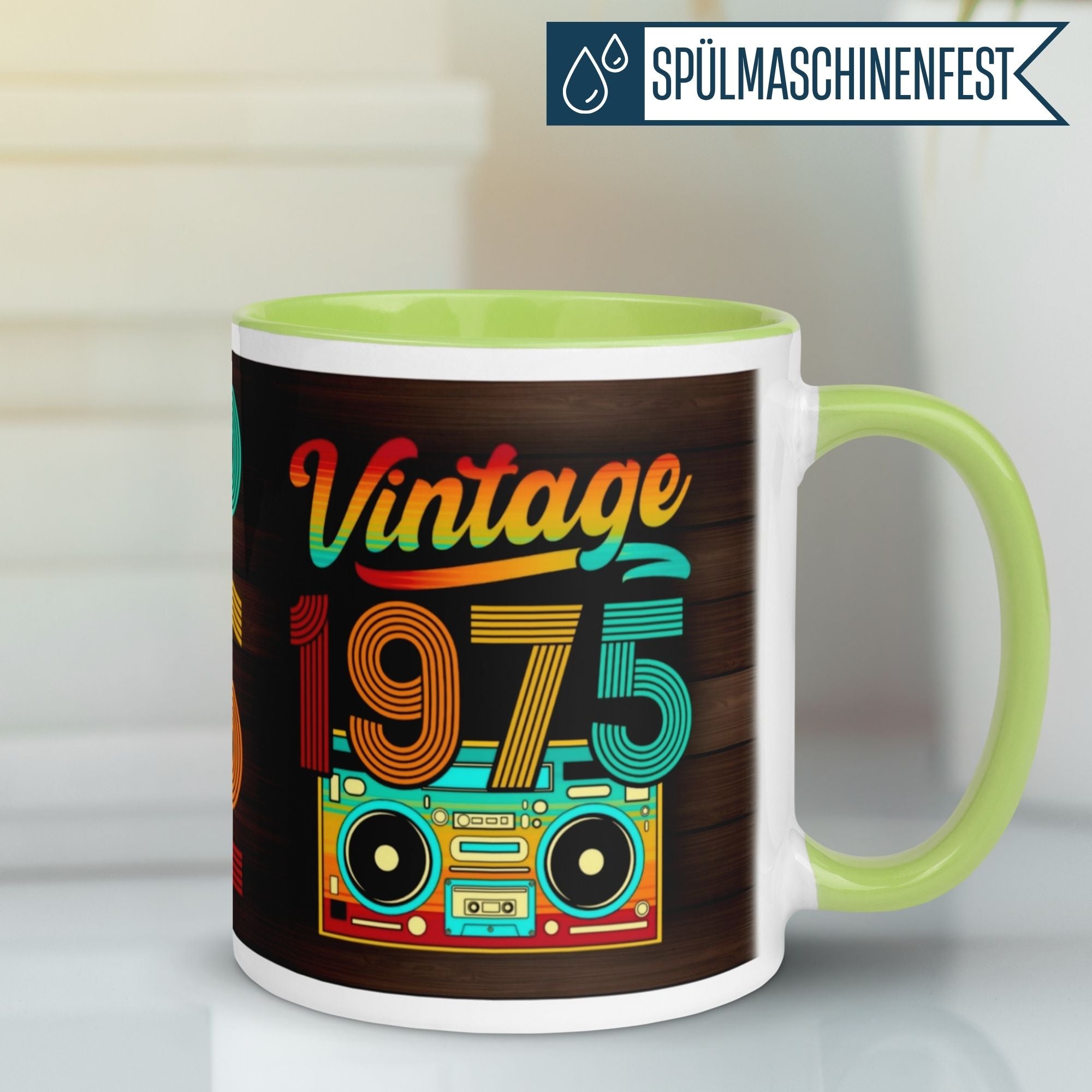 Momentals® Vintage 1975 Tasse für den 50. Geburtstag mit Retro-Design und buntem Grafikmotiv.