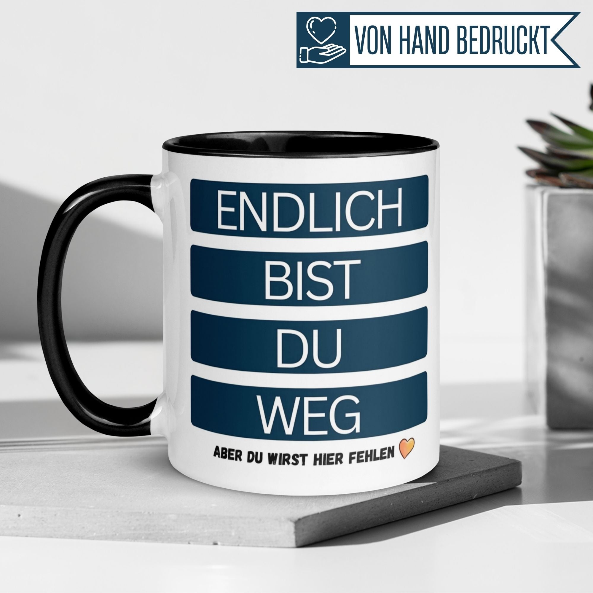 Momentals Tasse Abschied mit humorvollem Spruch: 'Endlich bist du weg – aber du wirst hier fehlen'.