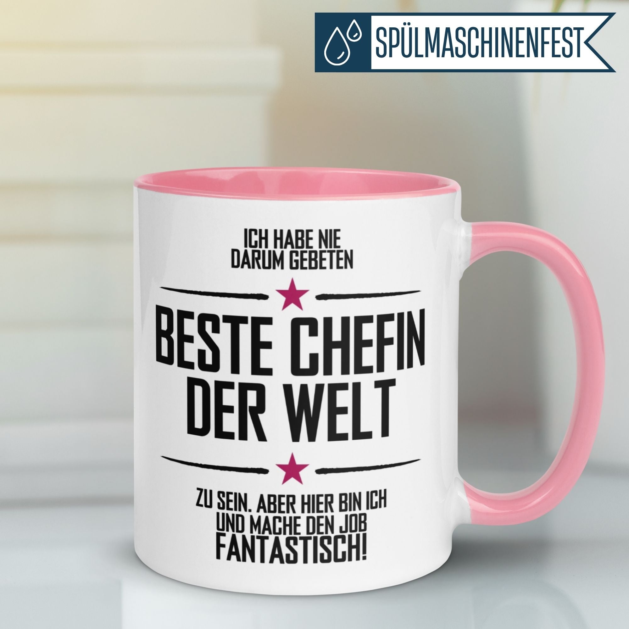 Momentals Tasse für die beste Chefin der Welt mit humorvollem Spruch und pinkem Innenleben.