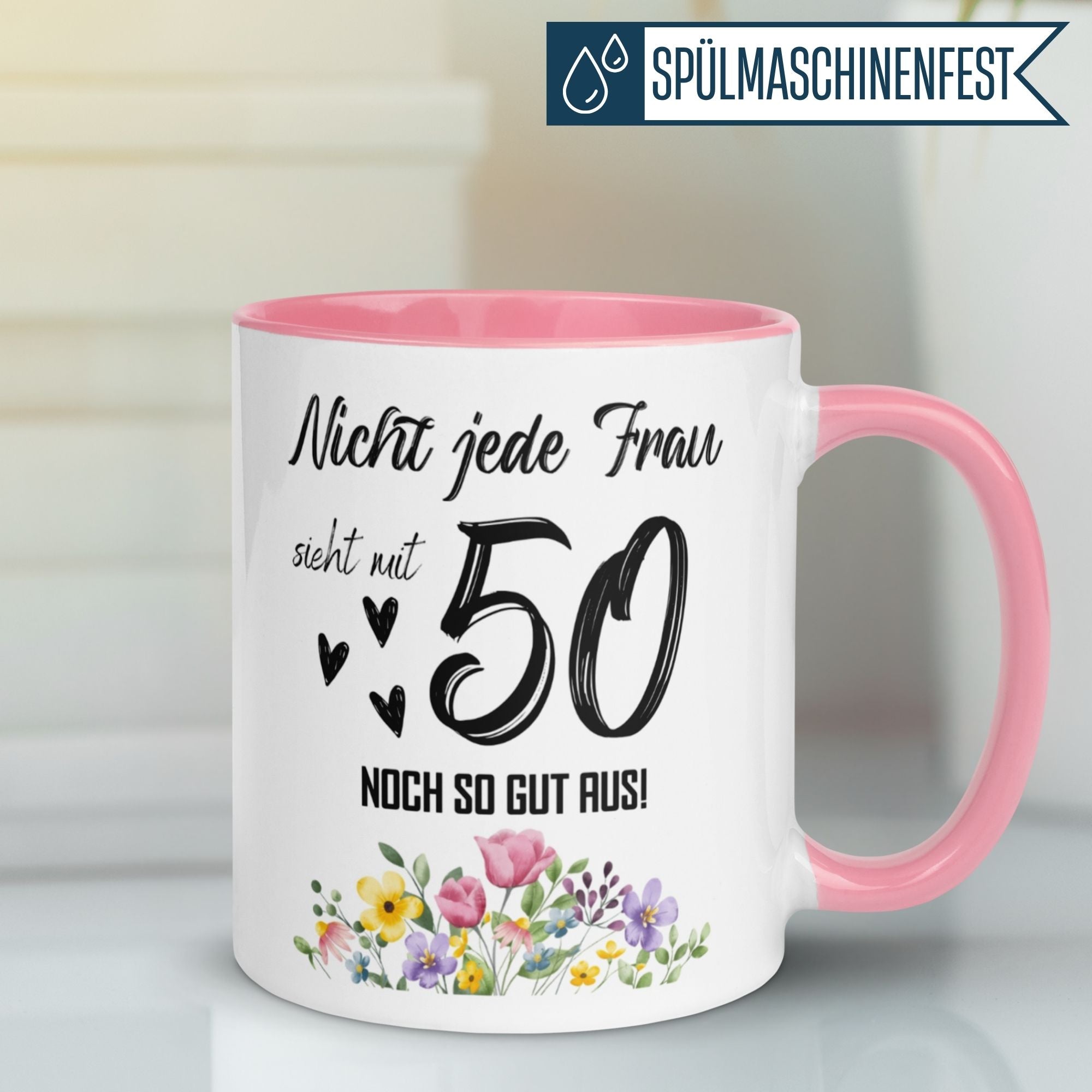 Momentals® Geburtstagstasse 50. für Frauen mit buntem Blumenmotiv und witzigem Spruch.
