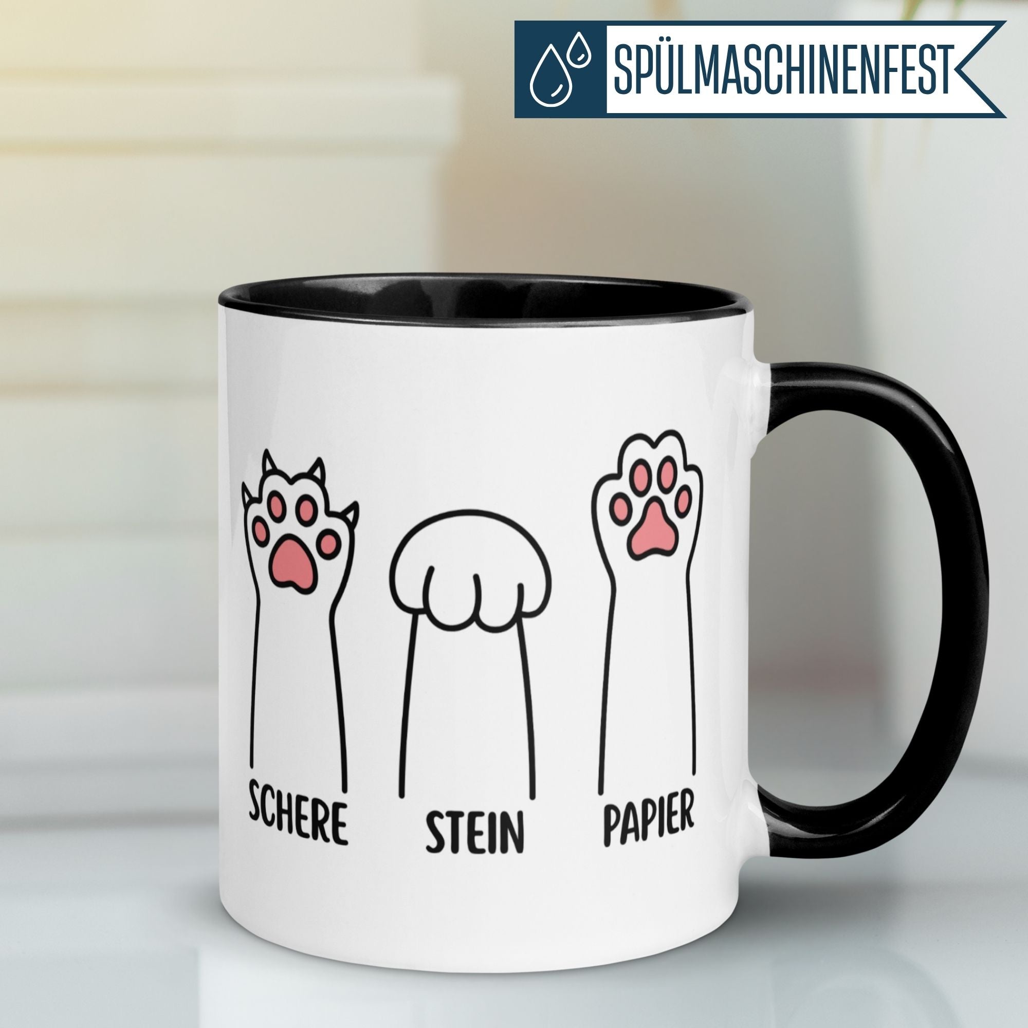 Momentals Tasse mit Katzenpfotenmotiv: Schere, Stein, Papier für humorvolle Katzenliebhaber.