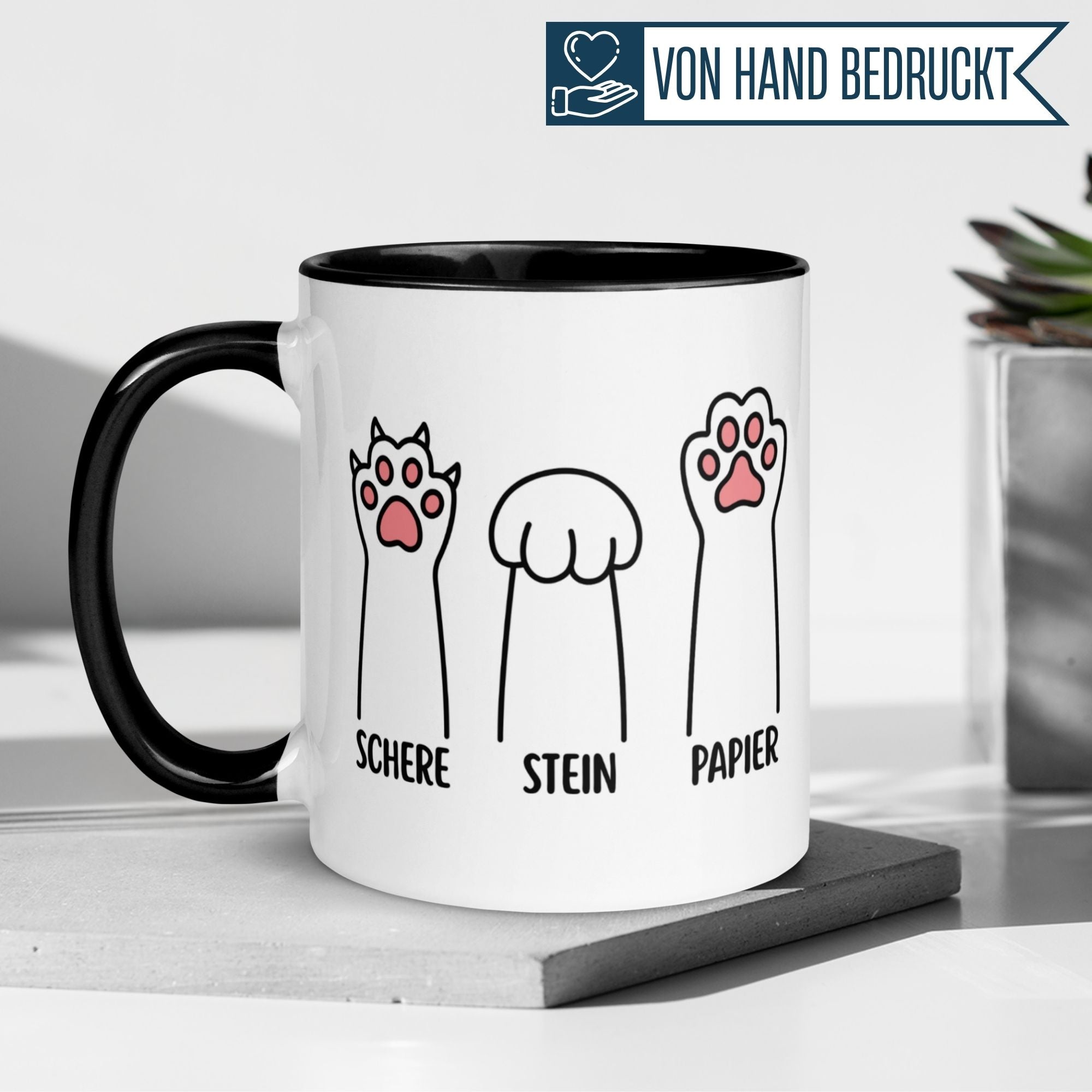 Momentals Tasse mit Katzenpfoten-Motiv: Schere, Stein, Papier - ideal für humorvolle Katzenliebhaber.