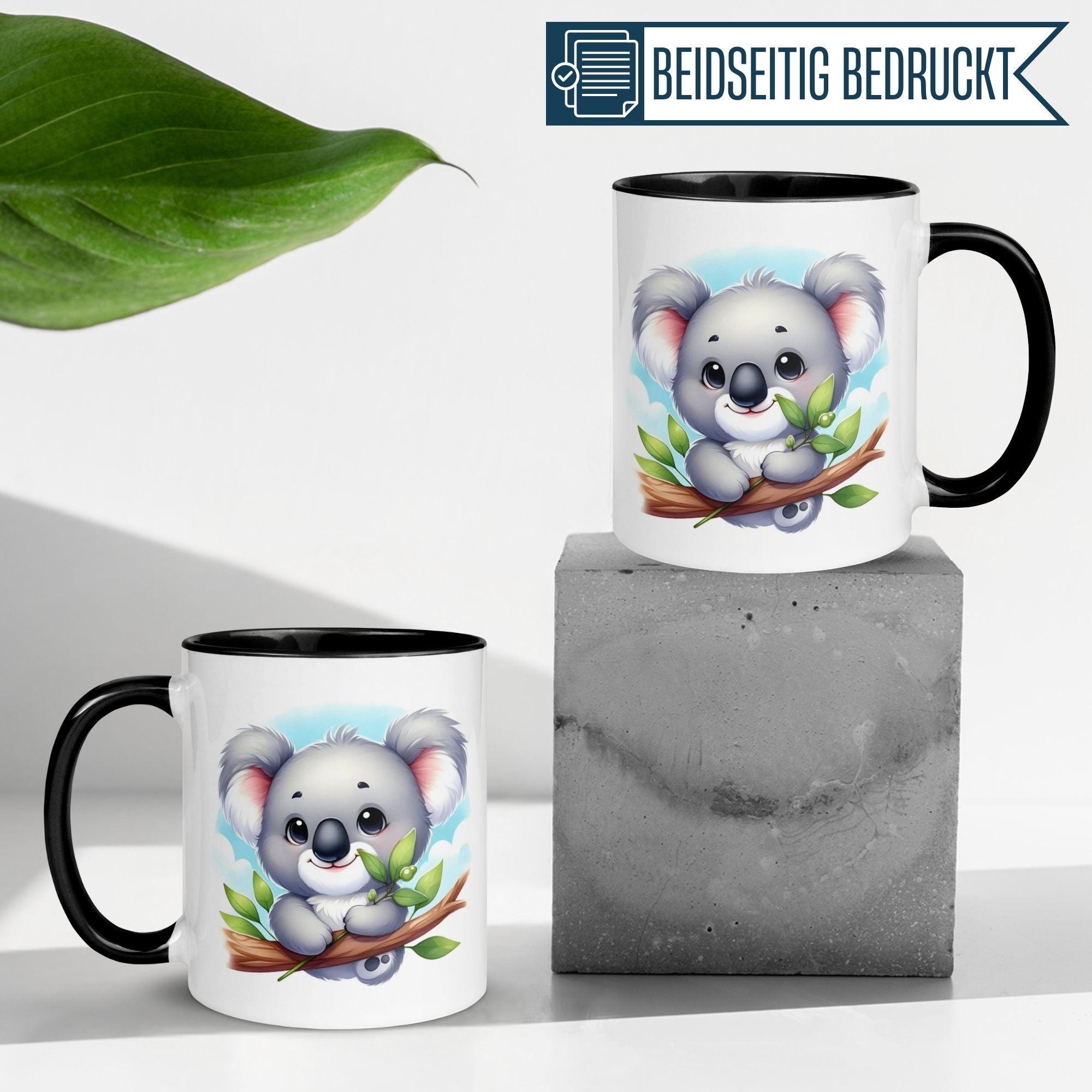 Momentals Koala mug on a concrete block, featuring a cute koala on a branch, perfect for coffee lovers.