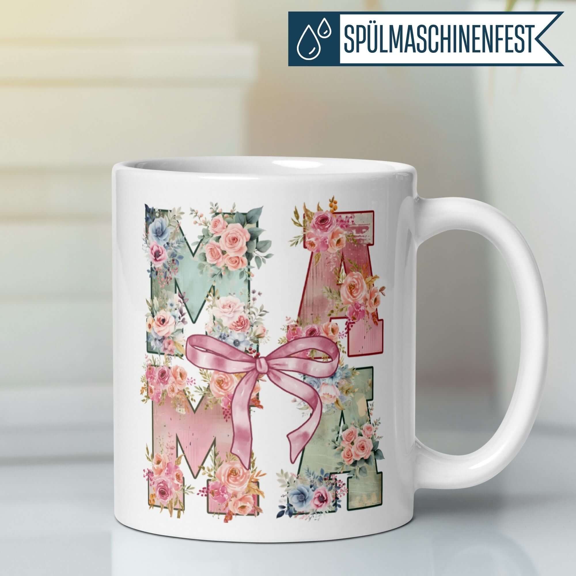Momentals Tasse Mama mit floralen Mustern und rosa Schleife, ideal als Geschenk für stilvolle Mamas.