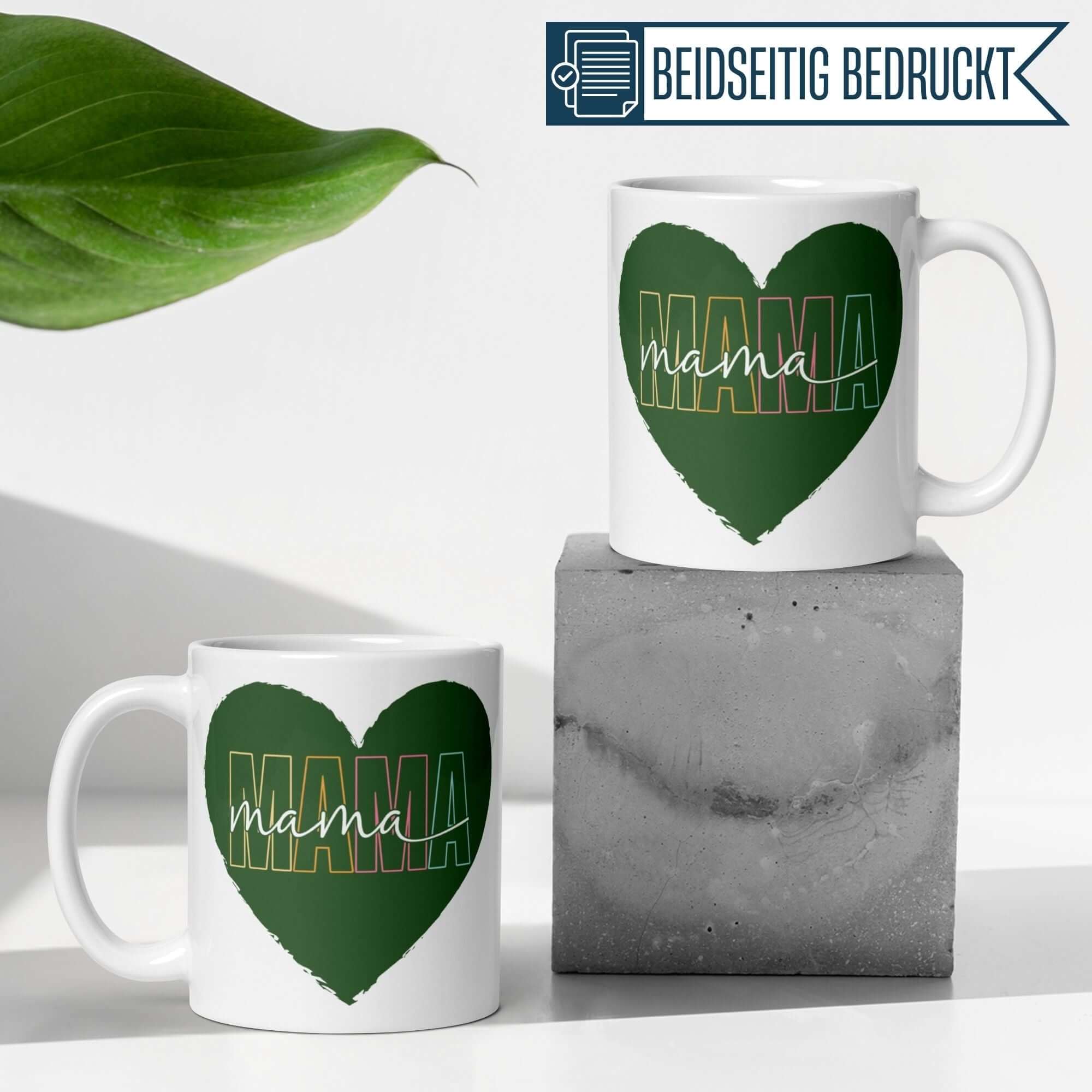 Colorful Momentals® Tasse for Mama with green heart design and vibrant lettering, perfect gift for Mother's Day.